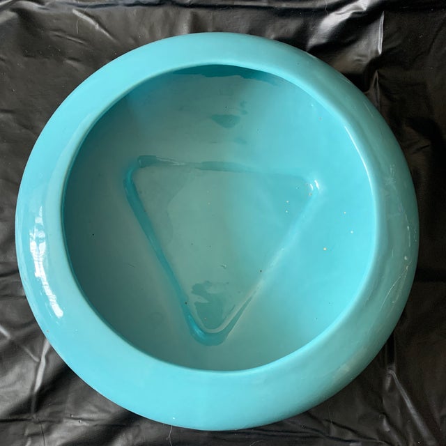 This light blue ceramic vessel is a vintage mid-century Royal Haeger console bowl, typically used as a succulent planter...