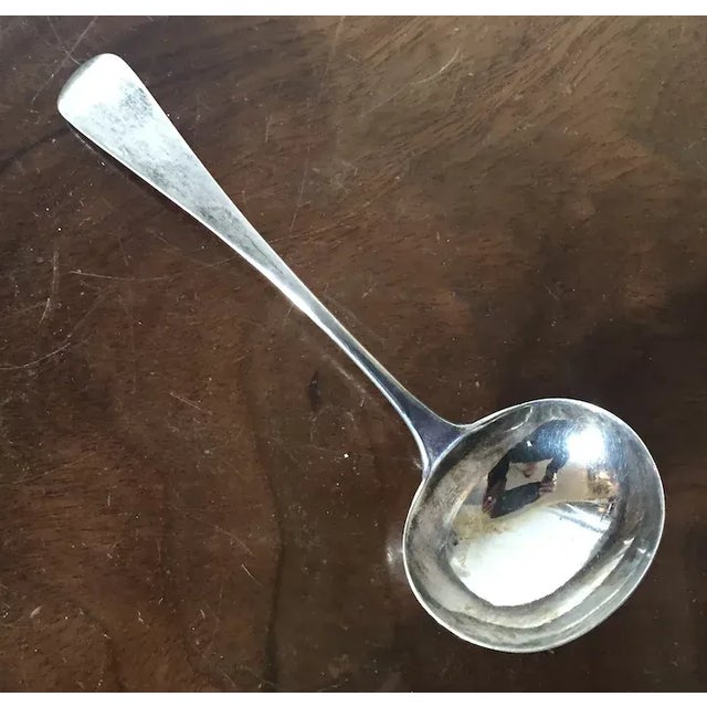 Antique early 19th century English Georgian hallmarked silver gravy or sauce ladle, London maker. Measures 7" long. Good...