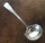 Antique early 19th century English Georgian hallmarked silver gravy or sauce ladle, London maker. Measures 7" long. Good...