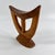 Ethiopian headrests come in various forms. They range from simple to elaborately carved artifacts. They have abstract...