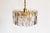 Beautiful gilded 1970s 'Palazzo' pendant lamp by the Austrian company Kalmar. Gilded metal frame surrounded by Murano...