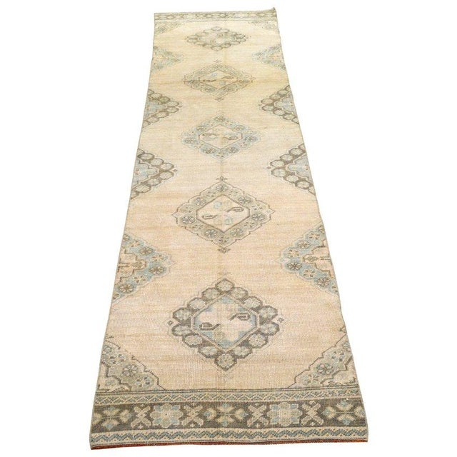 Hand-knotted with care using traditional rug-making techniques, this wool rug blends timeless craftsmanship with a modern...