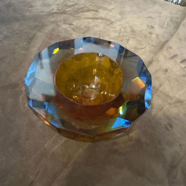 A round bowl designed and manufactured in Murano by Mandruzzato, lovely colors and very good conditions overall, it also...