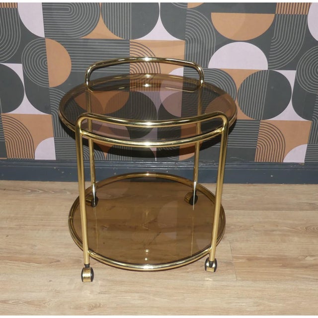 Elegant Bar Cart/Side Table Beautifully crafted, finely detailed Chrome-plated frame with a gleaming gold finish Shelfs...