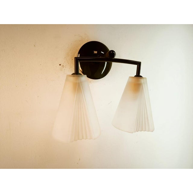 Green Guzzini Wall Light by Harvey Guzzini for Iguzzini, in Very Good conditions. Designed 1990 to 1999 This piece has an...