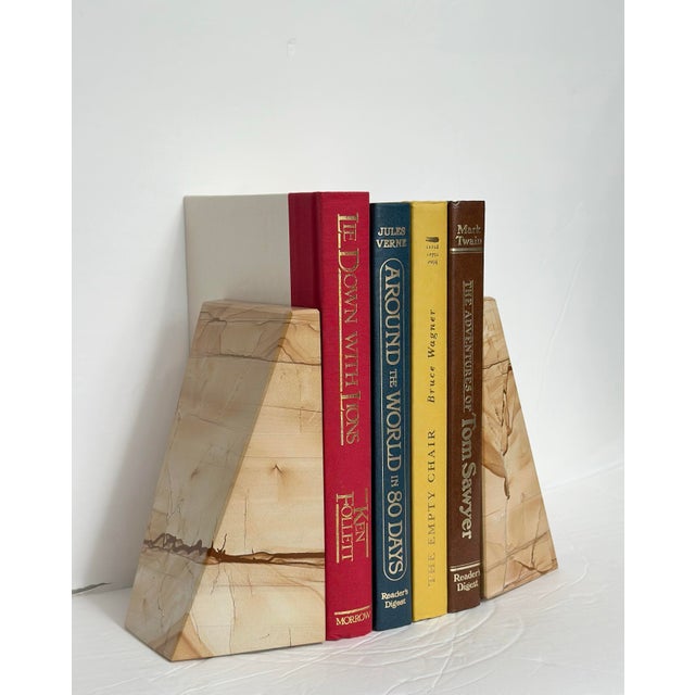 We are very pleased to offer this striking pair of solid picture jasper bookends, circa 1970s. Distinguished by a warm,...