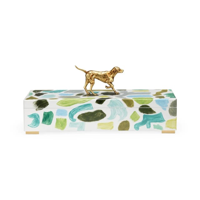 Hand painted hinged wood box in vibrant blues, greens and grays, featuring an antique gold dog accent. Designed by Elaine...