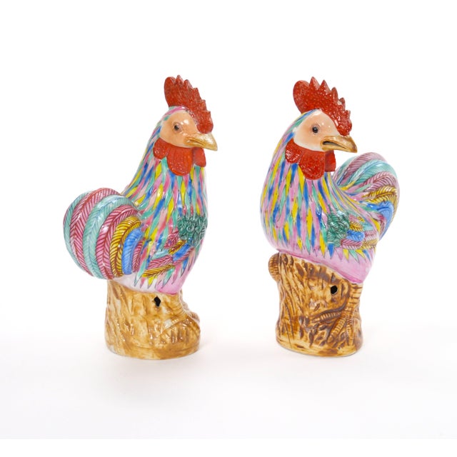A charming pair of early to mid-20th century Chinese Export porcelain roosters, beautifully hand-painted and decorated in...
