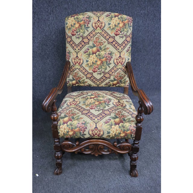 Jacobean style Arm chair , solid walnut carved frame , newly upholstered with floral needlepoint fabric