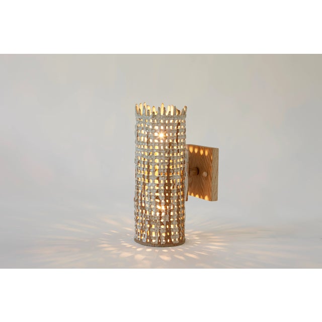 This basketweave sconce produces a beautiful light display. Rustic and modern for almost any wall and stunning in a pair....