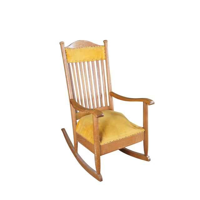 Antique Victorian country / farmhouse rocking armchair / rocker . Made of quartersawn oak featuring round slatted back and...