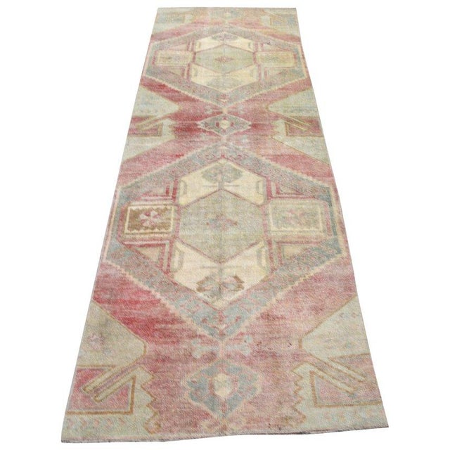 Hand-knotted with care using traditional rug-making techniques, this wool rug blends timeless craftsmanship with a modern...