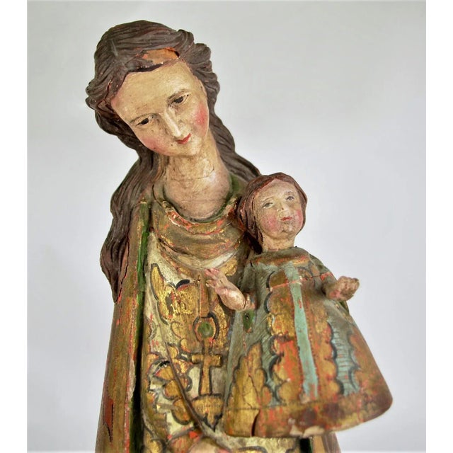 Outstanding 16th or 17th century Spanish figure of the Blessed Virgin Mary with the Child Jesus, carved wood, gesso and...