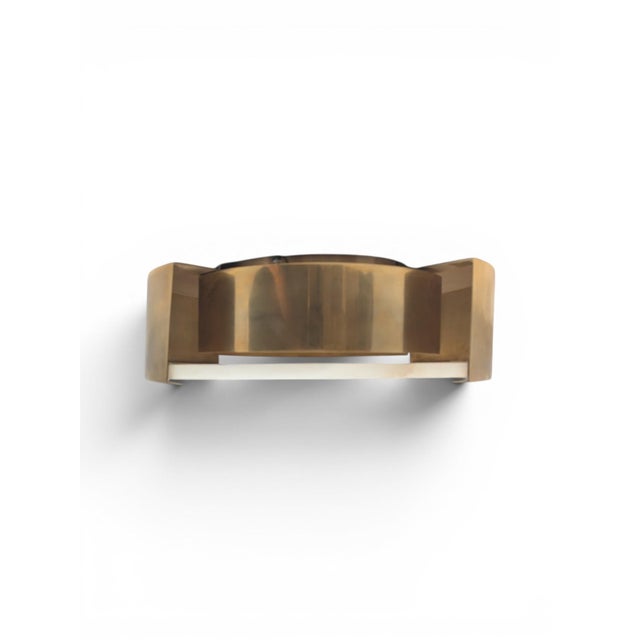 Size small natural alabaster flush mounts in antique-burnished brass finish. Streamlined metal detailing, Visual Comfort....