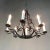 Antique Country French Wrought Iron Chandelier features tailored lines combined with subtle scroll work, all artistically...