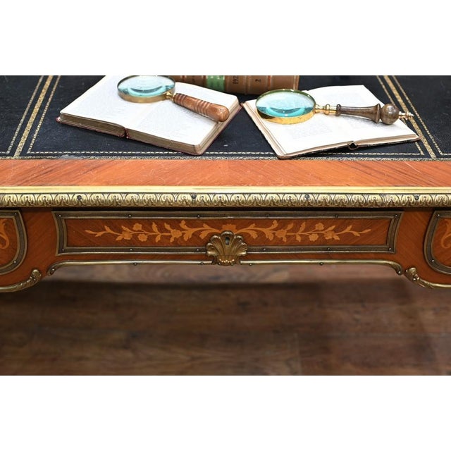 Quality antique French desk or bureau plat Classic look crafted from kingwood with original ormolu fixtures Good size at...