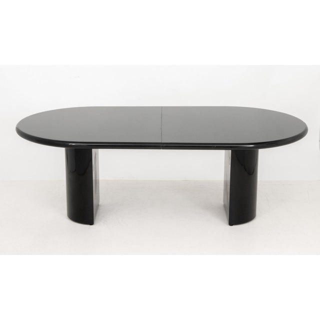 Intrex Habitat Postmodern Black Lacquered Extending Dining Table, with two extension leaves. 29" H x 84" W x 45" D; fully...