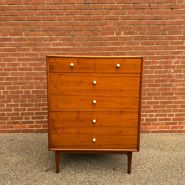 Designed by Kipp Stewart for Drexel’s Declaration collection, this walnut highboy features clean lines and thoughtful...