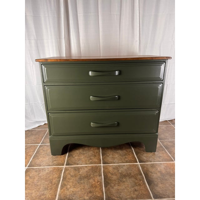 A beautifully restored vintage Cushman three-drawer dresser, thoughtfully updated with a sophisticated two-tone finish...