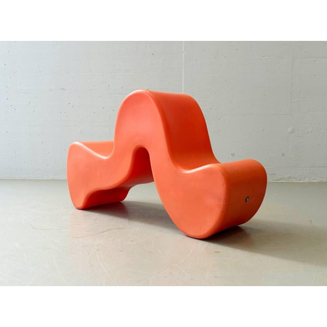An expressive plastic chair based on a design by verner panton, manufactured by densa basel in 1999. Its sculptural,...