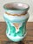 Small pottery vase, handmade in Vietri Italy, on the edge of the renowned Almalfi Coast. Painted in greens, orange, and...