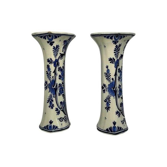 Pair of antique hand-painted Delft Blue trumpet vases by Royal Delft / De Porceleyne Fles, made in Delft in 1916. The...
