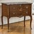 Graceful and beautifully detailed, this French Louis XVI style commode reflects the refined decorative tradition that...