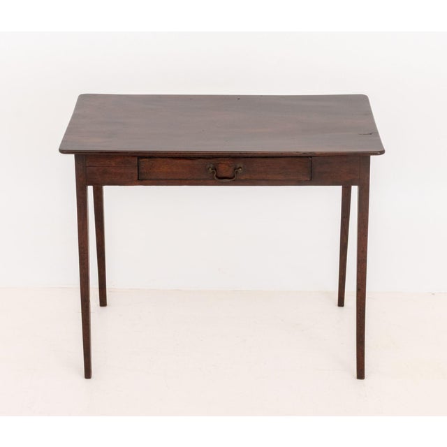 George III Mahogany Sofa Table, the single drawer with brass pull. 28.75" W x 35.75" W x 21.25" D. Provenance: An Upper...