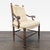 Rush seat with scrolled arms, button tufted back cushion, and fitted seat cushion. Dimensions (in): 25W x 19D x 37H.