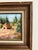 Original oil painting titled 'Looking Back' by Evie Grant, depicting a quiet rural scene with a winding path leading to a...