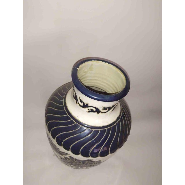 Beautiful vase realized in Capodimonte (Napoli) in the 1960s. Hand made and painted. Very minor chip on top of the neck.