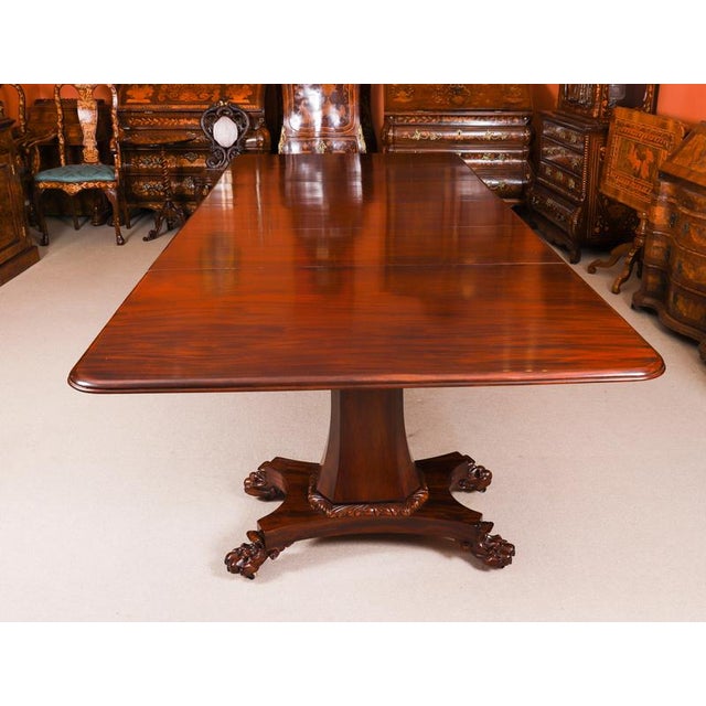 This is an elegant antique dining set that comprises an antique regency triple pillar dining table dating from c. 1830 and...