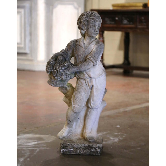 Decorate a garden or patio with this elegant antique outdoor statue. Made of cast stone in France circa 1920, the tall...
