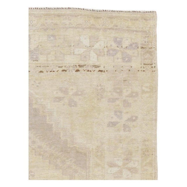 A vintage Turkish Oushak throw rug handmade during the mid-20th century. Measures: 3' 10" x 5' 10".