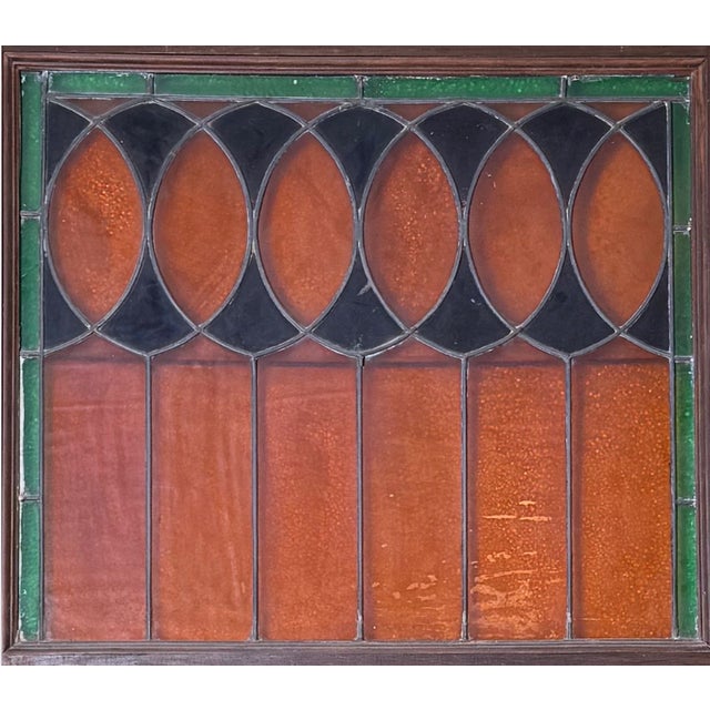 Four panel English antique exterior door dating back to the 1930's. Made of walnut and stained glass. All glasswork is...