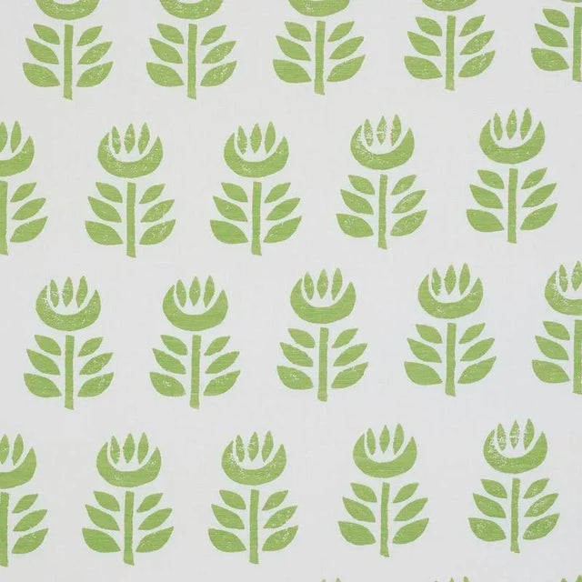 Screen printed on a linen ground, this simple, stylized tulip design has the perfectly imperfect look of a hand block...
