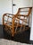 A gorgeous seat on which to rest your weary bones. This chair features 3 strand bent bamboo arms and a distinctive bent...