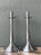 This striking pair of vintage chrome candlesticks embodies the clean lines and architectural elegance synonymous with Mid-...