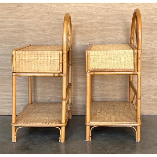 Pair of red bamboo nightstands with drawer and low shelve.