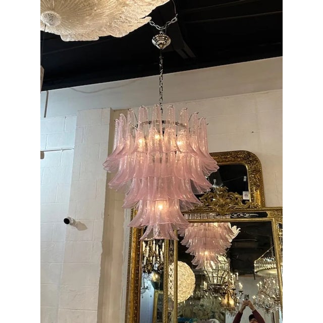 Modern Murano Saddle glass waterfall chandelier in soft pink. Circa 2000. The chandelier has been professionally rewired,...