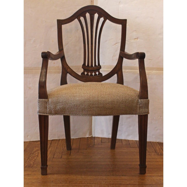 Circa 1800 George III period set of 12 dining chairs, English. Mahogany. A long set of 2 arms & 10 sides made for a fine...