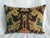 An exceptional antique Central Asian ikat pillow crafted from a rare mid 19th century Uzbek silk and cotton textile...