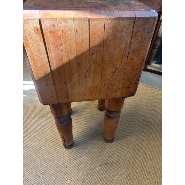 A solid maple butcher block of great manageable size at only 18" square, early 20th century and possibly French. Typical...