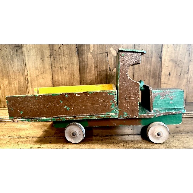 This cool toy truck was purchased about 40 years ago at an antique shop in High Point, NC. From England, the paint is...
