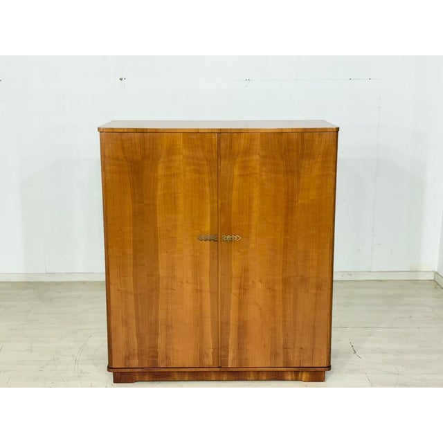 For sale is a stylish linen cupboard from the 1960s. This piece of furniture impresses with its simple mid-century design,...