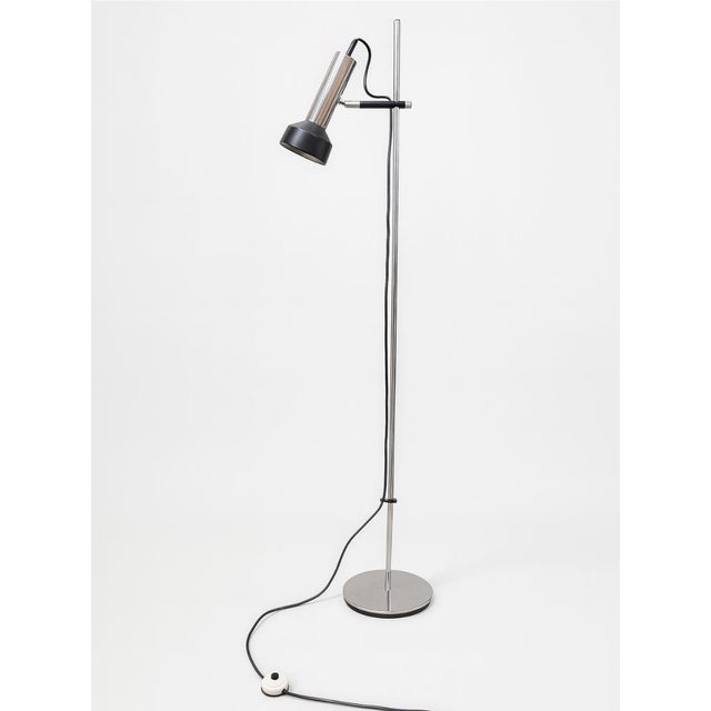 Floor lamp manufactured by Staff Leuchten in Germany, circa 1960s. A versatile and elegant piece with a chrome-plated...
