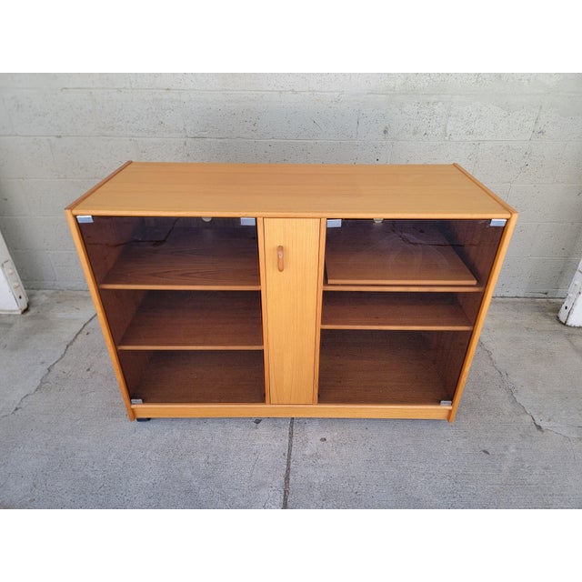 Teak Danish Modern stereo cabinet, circa. 1970's-1980's. Designed specifically to store and access stereo equipment....