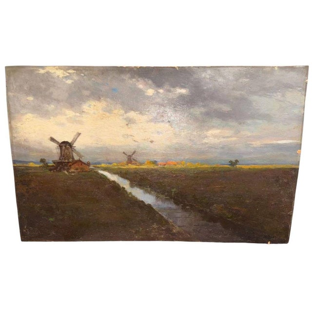 An atmospheric landscape with mills, painted in oil on panel by the Austrian artist Konstantin Stoitzner, one of the...