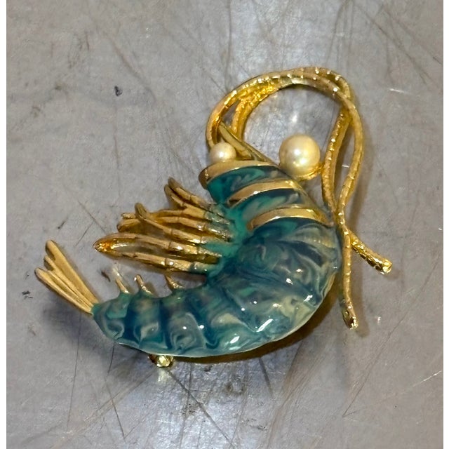 1950s-60s gold tone/green swirl/faux pearl shrimp brooch. Excellent condition.