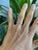 Five earth-mined diamonds sparkle in a clean line across this solid 14K white gold band. Slim and understated, it wears...